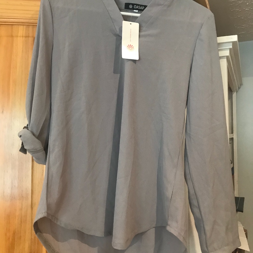 Convertible sleeve blouse. Never worn.